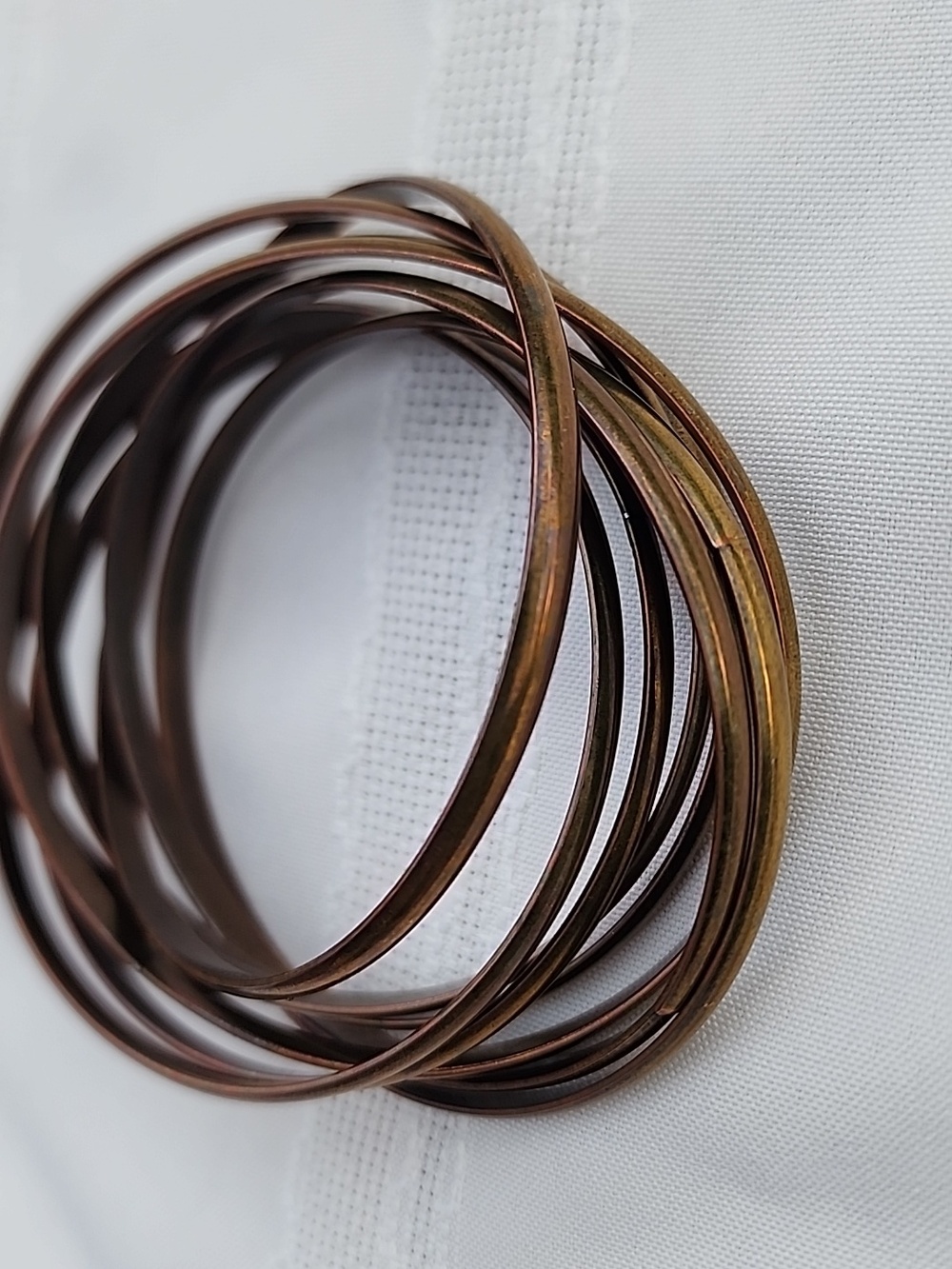 Set of 8 Vintage Attached Thin Copper-Brass Tone Bangle Bracelets.